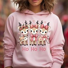 Get ready to shine this holiday season with our adorable girly reindeer shirt! Designed with a charming Christmas coquette theme, this festive shirt features an attractive reindeer graphic adorned with delightful bows, perfect Christmas Coquette Christmas Reindeer, Girl Reindeer Shirt Christmas Girly gift for anyone wanting to show off their holiday spirit in style. Made from soft, quality material, it's the ideal choice for a cozy and fun Christmas outfit. Whether you're attending a festive gat Pink Tops As Winter Gifts, Cute Winter Tops As Gift, Cute Winter Tops As A Gift, Cute Pink Top For Holiday, Cute Pink Holiday Tops, Cute Pink Holiday Top, Cute Pink Christmas Tops, Fun Christmas Outfits, Pink Reindeer Pajamas