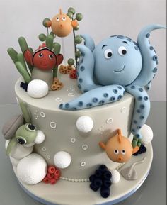 a cake with an octopus and other sea creatures on it