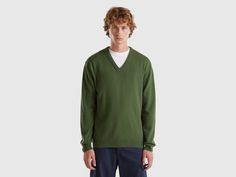 Sweater with V-neck in pure Merino wool, warm, lightweight and pleasant to the touch. A basic and versatile garment, suitable for different occasions of use. The presence of the Woolmark logo guarantees the high quality of the garments through the application and monitoring of specific standards in the production of wool, from breeding to the final product. Classic Green Long Sleeve V-neck Sweater, Casual Wool V-neck Top, Casual V-neck Merino Wool Top, Casual Merino Wool V-neck Top, Fine Knit Casual V-neck Sweater, Casual Wool V-neck Outerwear, Spring Wool V-neck Sweater, Casual Merino Wool V-neck Sweater For Winter, Casual Wool V-neck Sweater For Work