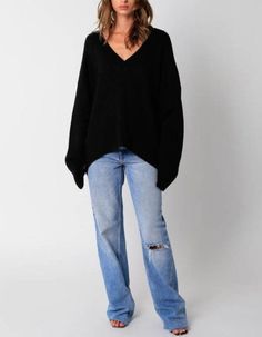 Our Elsie Sweater features a plunging v-neck and a oversized fit. 100% acrylic Made in China