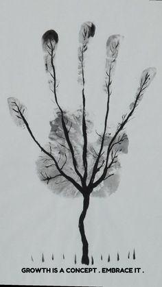 a black and white photo of a bare tree