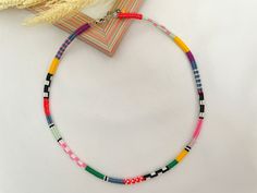 All my products are made of high quality Japanese Miyuki glass beads. This product is hand-woven. It is made using the traditional freehand technique with nylon thread. Each necklace took approximately 4-5 hours to make and was made using hundreds of beads. This hand-knitted ethnic necklace has a total of 13 different colors:Pink , Green and Yellow. For everyday style or special occasions. Miyuki Necklace length is 45cm (17.7 inches) and has an extra 5cm chain. Please contact for details 🎁 All Miyuki Necklace, Colorful Beaded Necklace, Miyuki Bead, Woven Necklace, Necklace Colorful, Bead Choker, Ethnic Necklaces, Miyuki Beads, Jewelry Boho