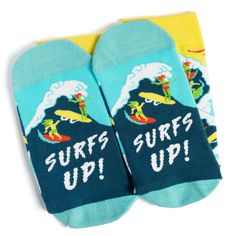 Dive into the ocean of style with our novelty Surf Socks! Crafted for surfers, boogie boarders, and wave enthusiasts, these socks are your ticket to beachside fun. The vibrant designs feature waves and surfers, while the surprise "Surfs Up!" message on the bottom adds an extra layer of charm. Slip into these comfy cotton-blend socks, and let the good times roll. Ride the waves of fashion with every step you take. Surfer Gifts, Beach Socks, Gifts For Surfers, Let The Good Times Roll, Every Step You Take, Good Times Roll, Surfs Up, The Ocean, Good Times