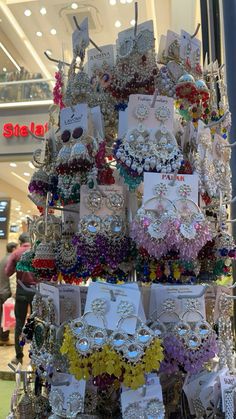 a display in a store filled with lots of earrings