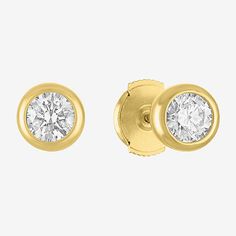 You'll love this contemporary pair of solitaire stud earrings for understated glamor everyday. Available in 14K White or Yellow Gold, this pair comes with 2 Lab-Grown Diamonds in a bezel setting for 1 carat in total. Features: Certified Diamonds, Diamond Bezel, Quick ShipDiamond Clarity: Si2-I1Setting: BezelShape: RoundStone Cut: RoundDiamond Color: G-HMetal Color: YellowEarring Length: 7mmEarring Width: 7mmRounded Carat Weight: 1 Ct. T.w.Care: Wipe CleanStone Type: 2 Lab Grown DiamondAuthentici Classic Yellow Gold Diamond Earrings For Formal Occasions, 14k Yellow Gold Earrings With Bezel Setting, Yellow Gold 14k Bezel Set Earrings, Classic Yellow Gold Earrings With Halo Design, Formal Gold Bezel Set Earrings, Classic Yellow Gold Diamond Earrings With Halo Design, Gold Round Brilliant Cut Earrings, Yellow Gold Round Earrings For Anniversary, Gold Brilliant Cut Earrings