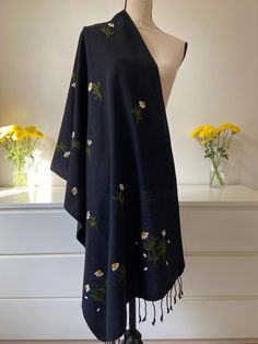 Hand Embroidered Cotton Shawl  Chamomile in Black (Late Bloom) You'll feel the love and hard work poured into creating this piece. *Dimensions: approx. 26 x 70 in *Care: Hand wash (Delicate) & Air dry (Tumble Low dry) *Material: Cotton *Note: May carry certain irregularities that are part of its unique charm Shawl Embroidery, Embroidery Shawl, Cotton Shawl, Astoria Ny, Black Shawl, Black Scarf, Unique Charms, Sewing Ideas, Shawls And Wraps