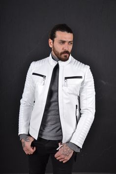 Leather jacket for men. soft light weight. Slim fit. Stand up collar. Chest and front zip pockets. Zips on the cuffs. Urban White Biker Jacket With Long Sleeves, White Urban Biker Jacket With Long Sleeves, Urban White Long Sleeve Biker Jacket, White Urban Biker Jacket For Winter, Urban White Winter Biker Jacket, White Urban Winter Biker Jacket, White Leather Jacket With Pockets For Winter, White Leather Jacket With Zipper For Streetwear, White Leather Jacket For Streetwear