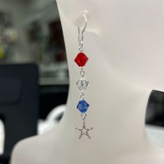 Show your patriotic spirit with our Red, White, and Blue Star Drop Earring Kit. This kit includes everything you need to create a pair of dazzling earrings perfect for any festive occasion: Swarovski Crystals: Red, blue, and clear Swarovski crystals that sparkle brilliantly, adding vibrant color and elegance. Sterling Silver Components: High-quality sterling silver eye-pins, headpins, flat with coil ear wires, and charming star accents for a polished and cohesive look. This kit is ideal for jewe Blue Patriotic Earrings For Independence Day, Patriotic Blue Earrings For Independence Day, Patriotic Blue Dangle Jewelry, Patriotic Nickel-free Jewelry For 4th Of July, Patriotic Earrings For 4th Of July, Patriotic 4th Of July Earrings, Nickel Free Dangle Jewelry For 4th Of July, Patriotic Adjustable Dangle Jewelry, Patriotic Dangle Earrings For Independence Day