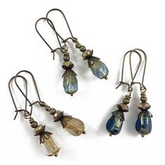 These handmade czech glass teardrop dangles are perfect to add a little sparkle to any outfit! Boho style dangle earrings featuring your choice of coloured czech glass teardrop beads with a rustic picasso finish, and natural brass ear wires - perfect for everyday wear!The earrings measure approx. 1 7/8" from the top of the ear wire to the bottom of the tear drop bead.Please note that this listing is for 1 - pair of earrings only, in your choice of colour;~ dark blue~ dark amethyst purple~ light Diy Earrings Dangle, Czech Beads Jewelry, Lucite Flower Earrings, Vintage Jewelry Ideas, Dark Amethyst, Outfit Boho, Dope Jewelry, Purple Light, Teardrop Beads