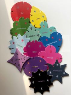 several different colored tags with stars on them