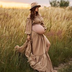 Camel maternity dress for photo session :  - two piece bohemian style gown - ruffled off the shoulder long sleeve crop top  - long maxi skirt with ruffle , it is longer in the back, the skirt has slits on both sides and adjustable waist  This gorgeous boho set is made of very soft, natural gauze material ( 100% cotton ).  All materials used are new and sewed by me. The material is certified by OEKO_TEX Standard 100 and GOTS - meeting all safety standards. SIZE : One size fits most  ( S- XL )  COLOR : TAN /camel Color / Colors on your monitor may differ slightly from the original. PRODUCT CARE: Hand washing or machine wash on gentle mode in lukewarm water and air-drying for best care, iron on medium to high heat, do not machine dry! SHIPPING : Standard shipping with UPS  or other depending Bohemian Style Gown, Bohemian Gown, Long Maxi Skirt, Off The Shoulder Long Sleeve, Long Maxi Skirts, Maternity Shoot, Long Crop Top, Soft Natural, Camel Color