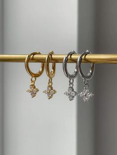 Delicate, dainty, and versatile, the Clover Huggies are the perfect earrings to add just a little bit of sparkle to your every day look. Available in both gold and silver and in tarnish resistant sterling silver, these are truly a perfect pair for your day in, day out jewelry look! Girls Life, Simple Jewelry, Huggies Earrings, Gold Plated Sterling Silver, Gold And Silver, Infinity Bracelet, Perfect Pair