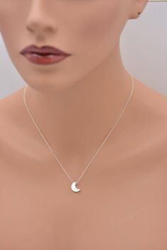 This lovely necklace makes a beautiful, lasting gift. I make this using 925 sterling silver chain and spring clasp. The crescent moon charm is a metal alloy with shiny silver finish and measures approximately 1/2 inch tall. It moves freely along the chain. Comes in a gift box, perfect for gift-giving. This piece looks great when paired with a star necklace. See 5th photo for both necklaces together. Listing is for moon necklace only but star necklace can be purchased here:www.etsy.com/listing/24 Silver Crescent Sterling Silver Charm Necklace, Silver Half Moon Charm Necklaces, Silver Dainty Moon Charm Necklace, Silver Half Moon Charm Necklace, Silver Moon Charm Necklace For Gift, Sterling Silver Moon Charm Necklace For Gift, Dainty Silver Necklace With Moon Charm, Sterling Silver Half Moon Charm Necklace, Elegant Moon Shaped Sterling Silver Charm Necklace