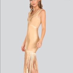 Sleeveless Deep V Neck Bandage Fringe Maxi Dress Comes In Sizes Small-Large And Two Colors Gold And Red. Glamorous Sleeveless Gold Midi Dress, Gold Sleeveless Midi Dress For Party, Gold Sleeveless Midi Dress For Evening, Glamorous Sleeveless Maxi Dress For Summer, Gold Sleeveless Midi Dress For Cocktail Events, Gold Sleeveless Evening Dress For Spring, Gold Sleeveless Dress For Spring Evening, Gold Sleeveless Summer Dress, Chic Gold Sleeveless Midi Dress