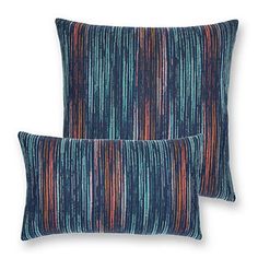 two blue and red pillows with stripes on the front, one has a square pillow in the