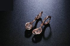 These casual occasion drop earrings come with high-class cubic zirconia work and are crafted of durable copper metal to add durability and a little sparkle that catches the light. Crafted with a fabulous rose gold color shade and a spiral design, these drop earrings add elegance, and are a perfect choice for daily wear.


Specifications

Earring Type: Drop Earrings
Item Type: Earrings
Fine or Fashion: Fashion
Brand Name: GeraldBlack
Style: Classic
Gender: Women
Shape\pattern: Geometric
Material: Spiral Design, Copper Metal, Engagement Jewelry, Rose Gold Color, High Class, Color Shades, Druzy Ring, Shape Patterns, Fashion Brand