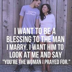 a man and woman standing next to each other in front of a wooden fence with the words, i want to be a blessing