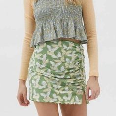 Urban Outfitters Green Butterfly Mini Skirt With Ruched Side Tie And Ruffled Hem. Never Worn. Perfect Condition. Casual Green Floral Print Skirt, Urban Outfitters Trendy Summer Skirt, Urban Outfitters Spring Bottoms With Lined Skirt, Spring Lined Skirt Bottoms By Urban Outfitters, Urban Outfitters Spring Lined Skirt Bottoms, Spring Urban Outfitters Lined Skirt Bottoms, Chic Urban Outfitters Mini Skirt For Spring, Urban Outfitters Summer Skirt, Green Fitted Casual Skirt