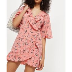 Brand New With Tags. Ruffled Neckline And Hem, Side Buttons, True Wrap. Length: 32.5” Bust: 21”, Waist: 16.5”. 100% Polyester. Feminine Floral Print V-neck Ruffle Dress, Feminine V-neck Ruffle Dress With Floral Print, Short Sleeve Floral Dress With Ruffles, Floral Ruffled Short Sleeve Dress, Spring Floral Print Ruffle Dress With Short Sleeves, Short Sleeve Ruffle Dress For Date Night, Short Sleeve Floral Dress With Ruffles For Brunch, Flirty Floral Dress With Ruffles And Short Sleeves, Chic Floral Dress With Ruffle Hem And Short Sleeves