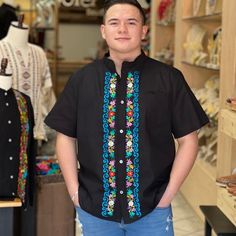 Traditional Black Embroidered Shirt, Traditional Black Shirt With Floral Embroidery, Traditional Short Sleeve Shirt With Multicolor Embroidery, Traditional Fit Embroidered Shirt, Traditional Fit Embroidered Shirt For Spring, Spring Embroidered Traditional Fit Shirt, Poncho With Sleeves, Mexican Sandals, Mexican Earrings