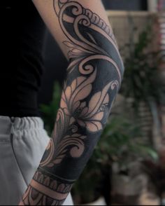 a person with a tattoo on their arm