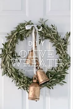 a wreath with bells hanging from it and the words diy olive wreath on top