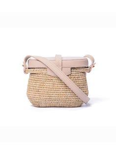 The Jabu Basket Bag in romantic pink quartz is sturdy, versatile and timeless. Handwoven in Eswatini, this woven basket bag is made from lutindzi grass – indigenous to Eswatini – and locally grown sisal fibre. The bag features a cuoio pink leather lid, gold hardware and hand carved cow horn details. Perfect for weddings, travelling, or an every day spring/ summer handbag. Beige Leather Basket Bucket Bag, Beige Straw Bag With Woven Leather Top Handle, Eco-friendly Woven Leather Bucket Bag, Chic Handwoven Natural Fiber Bucket Bag, Elegant Handwoven Natural Bucket Bag, Woven Leather Basket Bucket Bag, Natural Leather Woven Bucket Bag, Natural Leather Basket-shaped Bucket Bag, Natural Leather Basket Bucket Bag