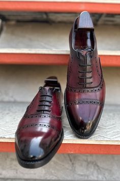 Burgundy lace-up punched oxford shoes with mirror glossed washed patina detailing and cap toe. - Aza Fashions Red Oxford Oxfords With Leather Sole, Red Oxfords With Leather Sole, Cap Toe Dress Shoes With Red Sole For Derby, Burgundy Brogue Oxfords With Plain Toe, Burgundy Oxfords With Brogue Detailing And Plain Toe, Burgundy Brogue Cap Toe Dress Shoes, Burgundy Cap Toe Leather Shoes With Brogue Detailing, Burgundy Goodyear Welted Wingtip Oxfords, Goodyear Welted Burgundy Wingtip Oxfords