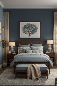 a bedroom with blue walls and furniture in the corner, along with a tree painting on the wall