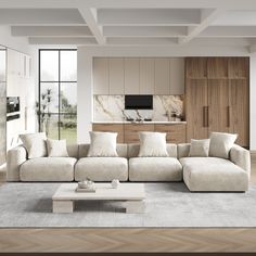 a living room filled with furniture and a large window next to a wall mounted tv