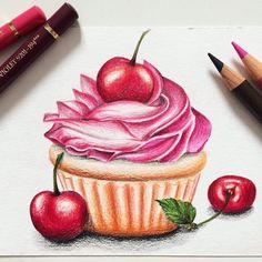 a drawing of a cupcake with cherries on it and two crayons