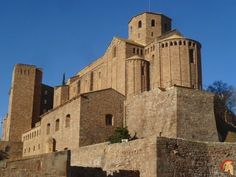 an old castle with two towers on top