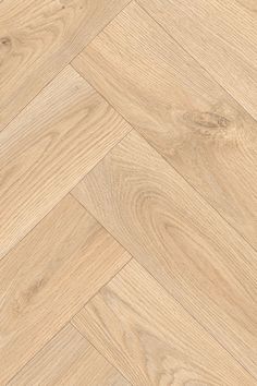 A light-toned cushion vinyl floor featuring realistic wood-effect and herringbone pattern, by LeoLine Flooring. Vinyl Plank Flooring Herringbone Pattern, Vynil Plank Flooring, Herringbone Vinyl Floor