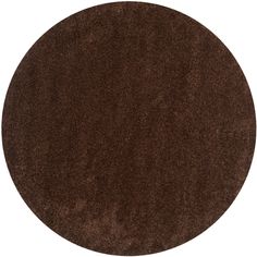 a round brown rug on a white background