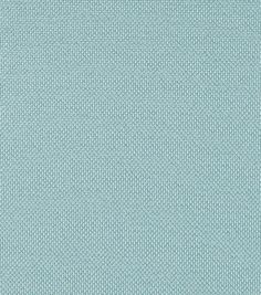 a light blue fabric textured with small dots and lines, as well as the background