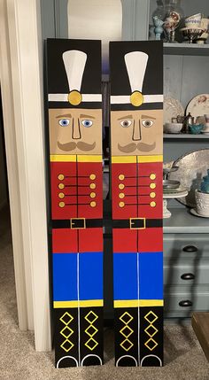 a pair of skis made to look like the nutcrackers are standing next to each other