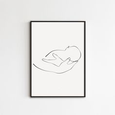 a black and white line drawing of a person sleeping on their stomach in a minimalistic manner