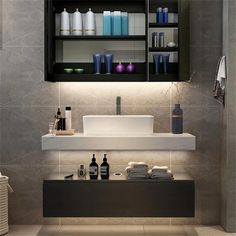 a bathroom with a sink and shelves filled with bottles