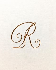 the letter k is drawn in brown ink