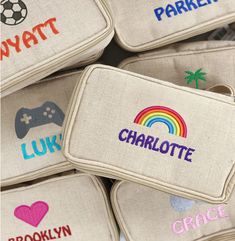 embroidered name labels on linen pouches for children's games and activities, including video games