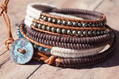 "Earthy and 100% Boho, this leather wrap will be your favorite.  The many textures and different stone types gives this one of a kind wrap a unique look. Made with off white hemp cord, waxed cotton thread, pyrite nuggets, beautiful teal Swarovski crystals, a petina blue cornflake button and gorgeous reddish brown leather. Size: 7 - 8 \" wrist  * two different loop sizes for size variation" Backyard Homesteading, Fall Fashion Accessories, Stacked Bracelets, Indie Jewelry, Jewelry Education, Herringbone Stitch, Artisan Bracelets, Hemp Cord, Turquoise Leather