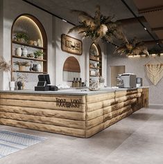 an empty counter in the middle of a room with wooden shelves and plants hanging from the ceiling