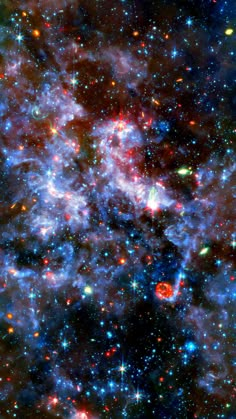 an image of some very pretty stars in the sky with many colors and shapes on them