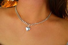 Chain is adjustable. (Not a real locket) Trendy Silver Heart Metal Necklace, Trendy Silver Metal Heart Necklace, Trendy Silver Heart Necklace With Chunky Chain, Trendy Silver Chain Heart Jewelry, Silver Heart Choker Necklace With Chain, Silver Heart Necklace With Chunky Chain For Gifts, Trendy Personalized Silver Heart Necklace, Silver Metal Heart Choker Necklace, Heart-shaped Silver Chain Jewelry