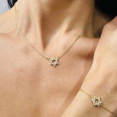 Introducing the Pave Star of David, a gorgeous and dainty accessory that is the perfect size. Carefully crafted with pave stones, this necklace is perfect by itself or layered with other pieces. Elevate your style with this elegant and versatile design.  About this item: Material: 18k Yellow Gold Filled Length: 16" with 1. 5" extension Cubic Zirconia Closure: Lobster Clasp Recommended to remove before showering, washing hands, swimming or any activities involving water. Avoid chemicals such as s Star Of David Necklace, Washing Hands, September Birthstone Jewelry, August Birthstone Jewelry, July Birthstone Jewelry, Gifts For New Mums, Jewelry Ring Box, Pearl Jewellery Earrings, Men's Jewelry Rings