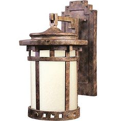 an old - fashioned wall light is shown against a white background