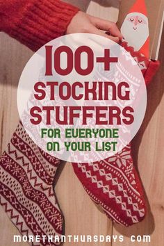 someone is holding their christmas stockings with the text, 100 + stocking stuff for everyone on your list