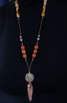 "A lovely combination of agate and quartz gemstones, antique copper chain, handmade copper components and clasp, and accented with my handmade lampwork glass beads, wire wrapped with a hand formed folded copper leaf, made by moi, and little gemstones. This super long, one of a kind lampwork necklace measures 33\" with a 5\" pendant and will arrive beautifully packaged. Sure to garner lots of compliments! To view more jewelry and handmade beads, click here... https://www.etsy.com/shop/StoneDesign Bohemian Wire Wrapped Czech Glass Beaded Necklace, Bohemian Wire Wrapped Beaded Necklaces With Czech Glass, Bohemian Czech Glass Beaded Necklace With Wire Wrap, Bohemian Czech Glass Wire Wrapped Beaded Necklace, Artisan Wire Wrapped Czech Glass Necklaces, Artisan Czech Glass Wire Wrapped Necklaces, Artisan Wire Wrapped Czech Glass Necklace, Bohemian Agate Beaded Chain Necklace, Bohemian Beaded Chain Copper Necklaces