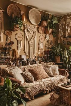 a living room filled with lots of plants and wicker baskets hanging on the wall