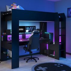 a black loft bed with purple lighting in the corner and desk on top of it